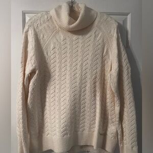 Cable knit turtleneck sweater